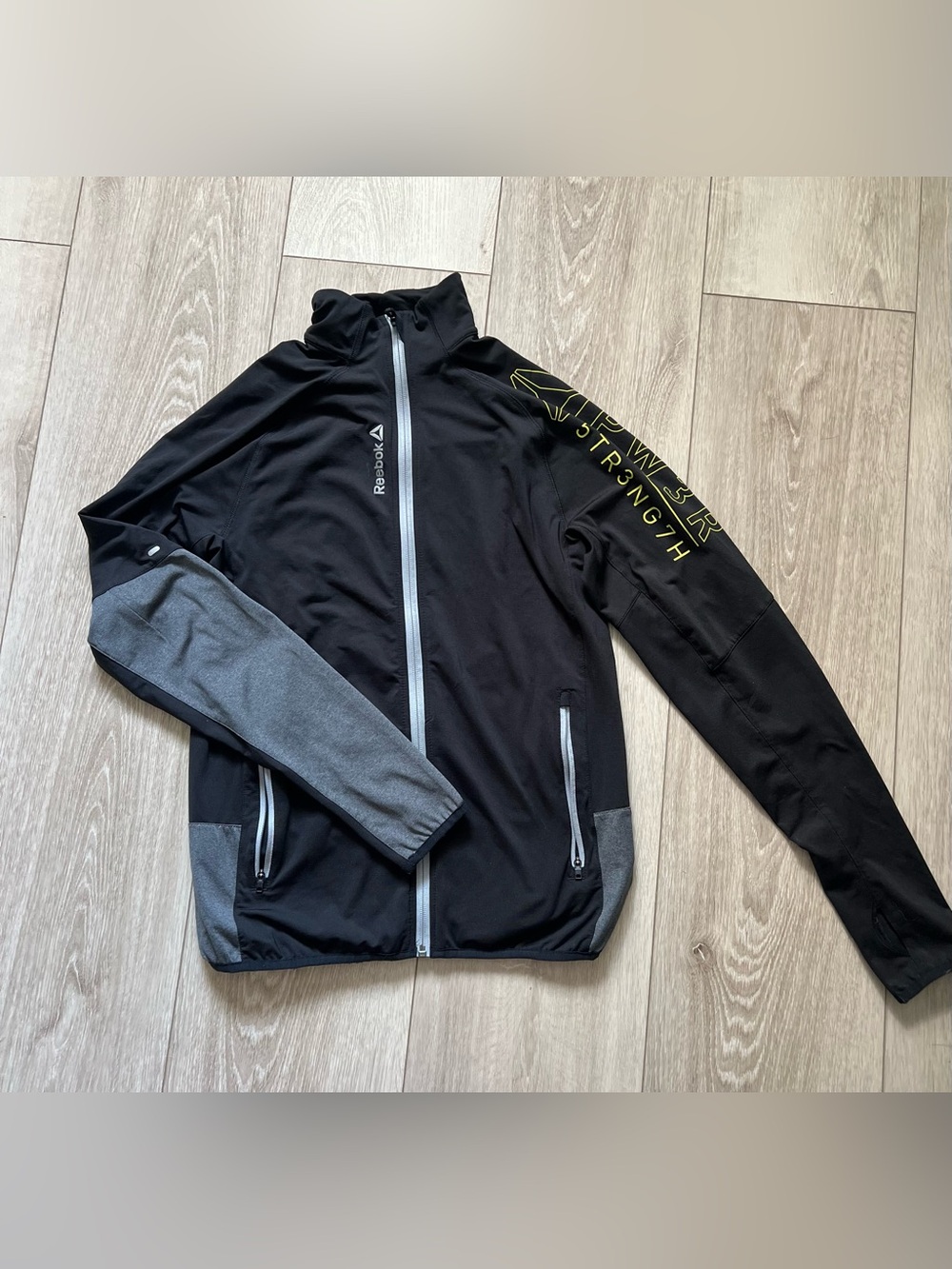 Reebok Men's Black Jacket with Gray Panels and Yellow Accent